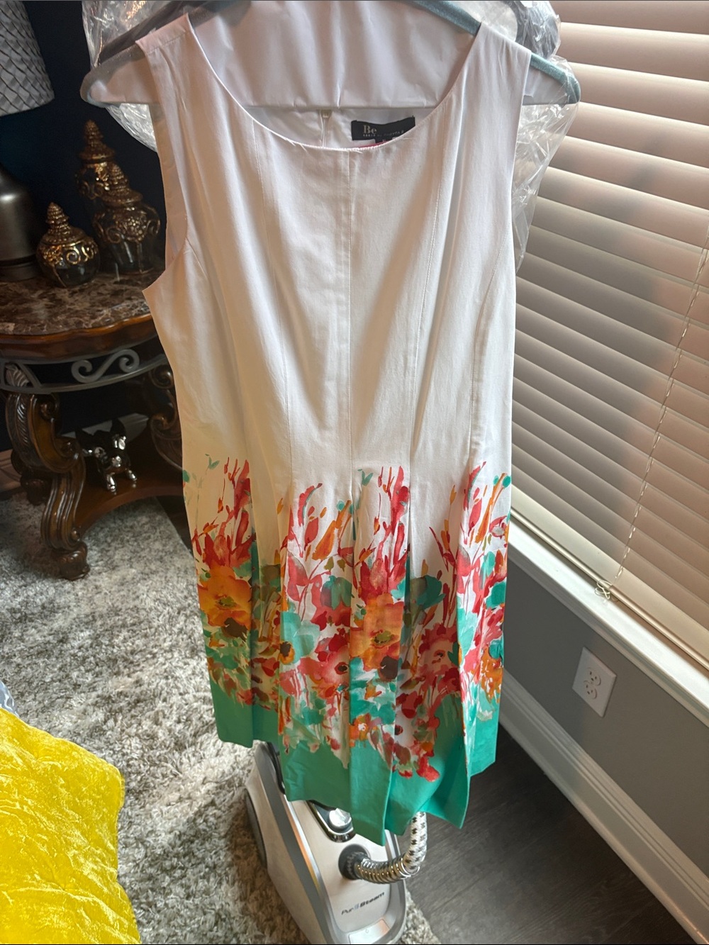 White Sleeveless Dress with Turquoise and Coral Floral Hem